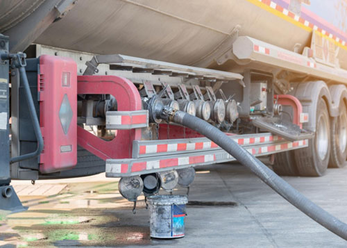 A chemical transport tanker being filled up.