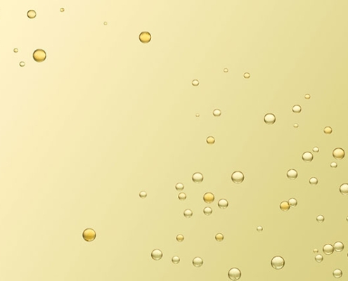 Yellow liquid with bubbles forming.